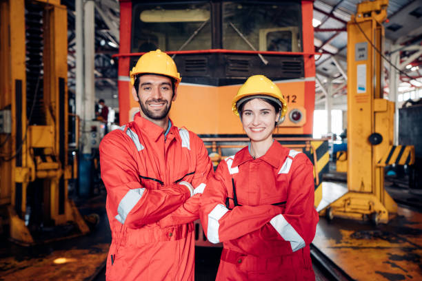 istock Team of engineer railway wearing safety uniform and helmet under checking under train ,wheels and control system for safety travel passenger. 1482998121