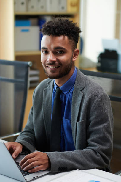 istock Positive Businessman Answering E-mails 1483001692