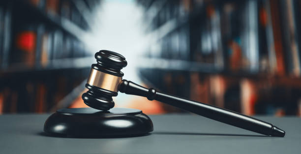 istock Focus wooden gavel hammer on blur background. equility 1483002031