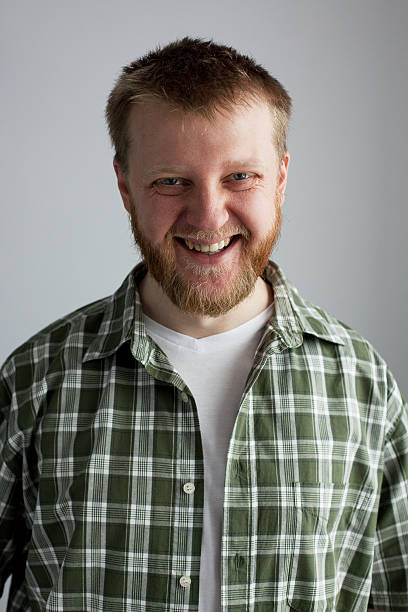 istock Young man in a plaid shirt 148300205
