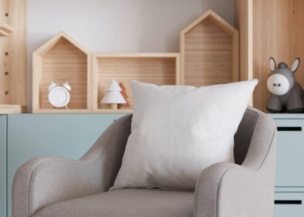 istock White square pillow in kids room. Blank cushion case template for your graphic design presentation. Pillow cover mock up for print, pattern, personalized illustration. Close-up. 3D rendering. 1483002247
