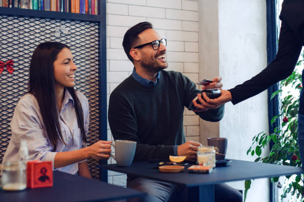 istock Man paying bill at fancy restaurant 1483002904