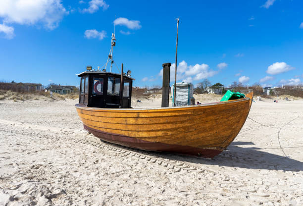 istock fishing boat on the beach baltic sea 1483004739