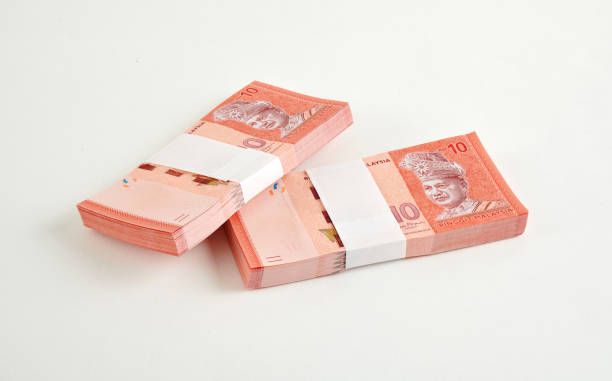 istock Bundle of money. Malaysia Ringgit (MYR) RM10 isolated white background 1483005808
