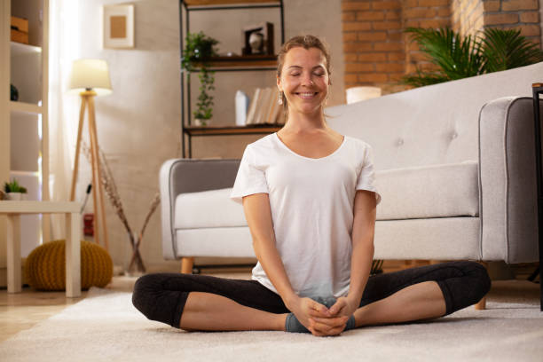 istock Young woman working out at home. 1483006211