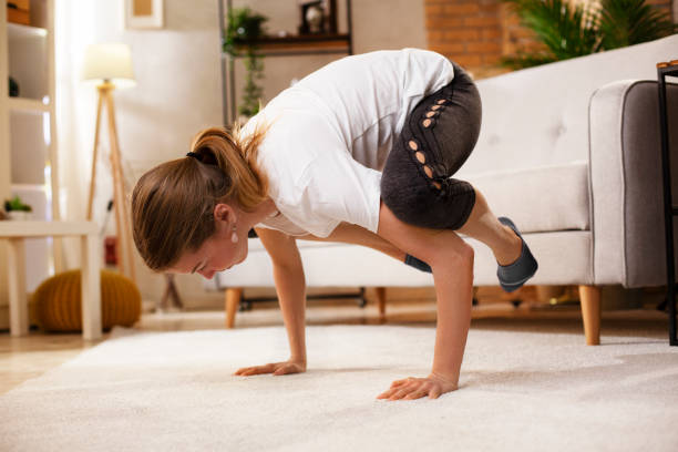 istock Young woman working out at home. 1483006269