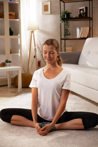 istock Young woman working out at home. 1483006274