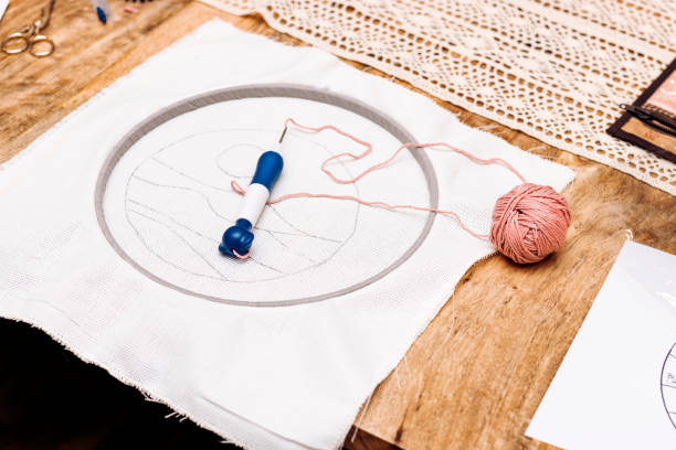 istock Punch Needle Workshop. Knitting needle ready to knit. 1483007234