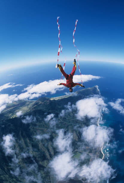 istock Skydiver in free fall with colourful streamers 1483010326