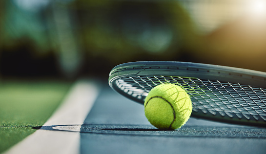 Tennis ball, racket and court ground with mockup space, blurred background or outdoor sunshine. Summer, sports equipment and mock up for training, fitness and exercise at game, contest or competition