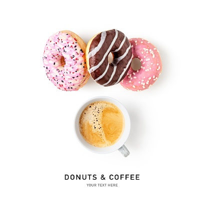 Donuts and coffee cup creative layout isolated on white background. Sweet food and holiday concept. Tasty dessert with colorful doughnuts. Flat lay, top view. Design element