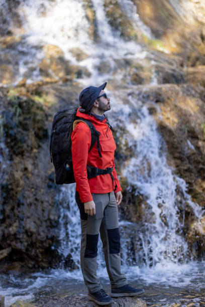 istock Man traveling relaxing alone with river canyon view. 1483018393