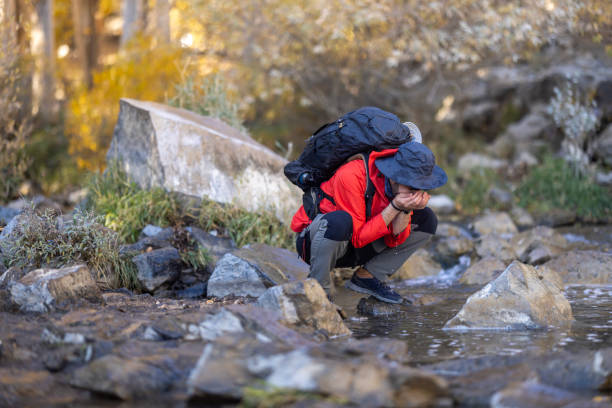 istock Man traveling relaxing alone with river canyon view. 1483018734