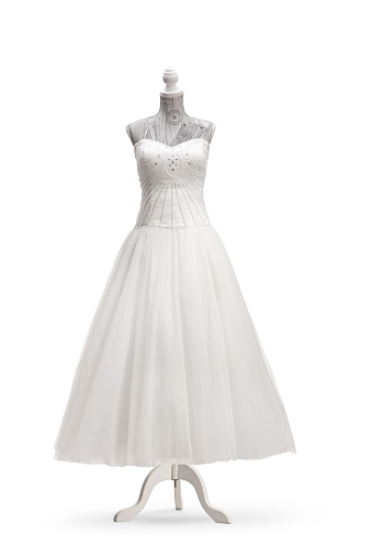 White wedding dress on a mannequin doll isolated on white background