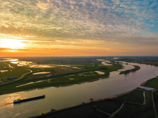 istock Ship sailing on the river IJssel during sunset panoramic bird's eye view 1483020813