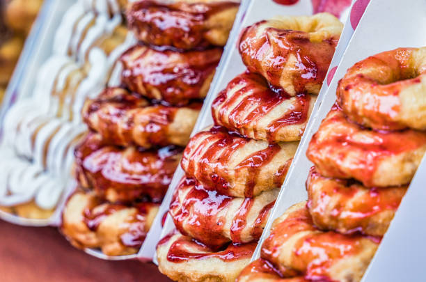 istock Juicy delicious glazed mini donuts sweets 1483021763