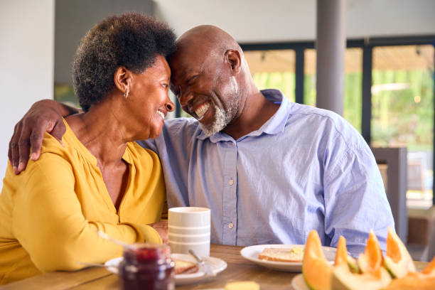 istock Senior Couple At Home Enjoying Breakfast Around Table Together 1483023631