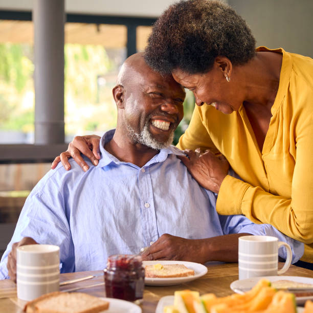istock Senior Couple At Home Enjoying Breakfast Around Table Together 1483023655