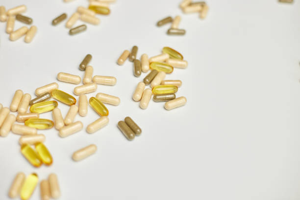 istock Different pharmaceutical medicine pills, tablets and capsules, on white background, Medicine concept, Heap of pills 1483027162