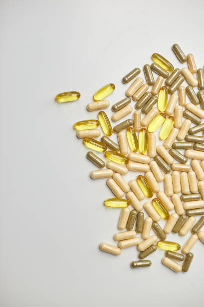 istock Flat lay, top view Different pharmaceutical medicine pills, tablets and capsules, on white background, Medicine concept, Heap of pills 1483027180