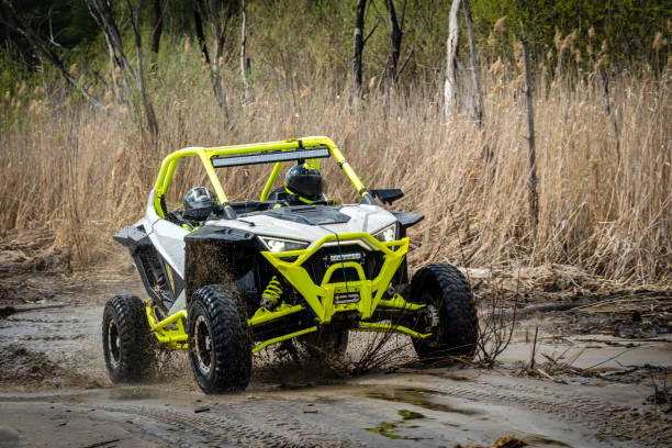 istock Cool view of active 4x4 vehicle driving in mud and water at spring 1483028388