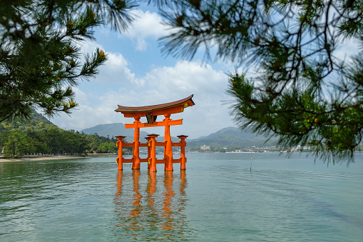 Hatsukaichi, Japan - April 17, 2023: Floating Torii at Itsukushima Shrine on Itsukushima Island, Hiroshima Prefecture, Japan.