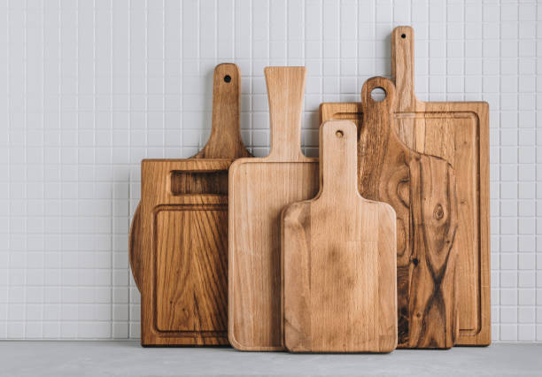 istock Kitchen utensils background with set of wooden cutting boards 1483038261