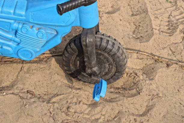 istock one small plastic black blue wheel with pedals on a childrens bicycle 1483038908