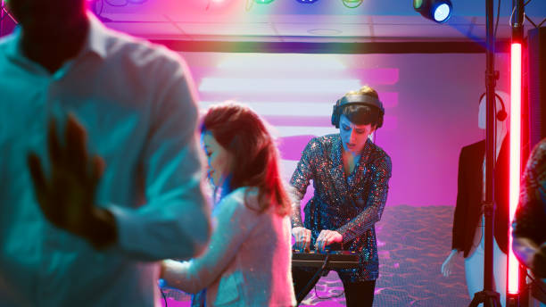 istock Diverse people dancing on music at club 1483041536