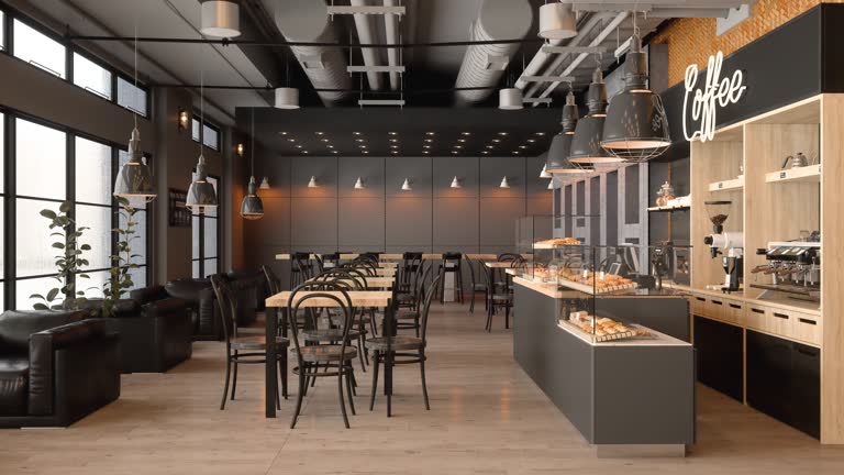 Empty Coffee Shop Interior With Wooden Tables, Coffee Maker, Pastries And Pendant Lights