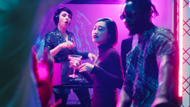 istock Cool woman DJ mixing music on stage 1483041981