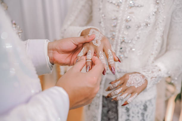 istock Engagement Ring With Indonesian Traditional Clothes Kebaya 1483042805