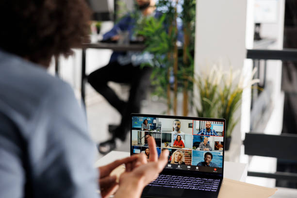 istock Entrepreneur leading virtual meeting with startup team in videocall 1483043780