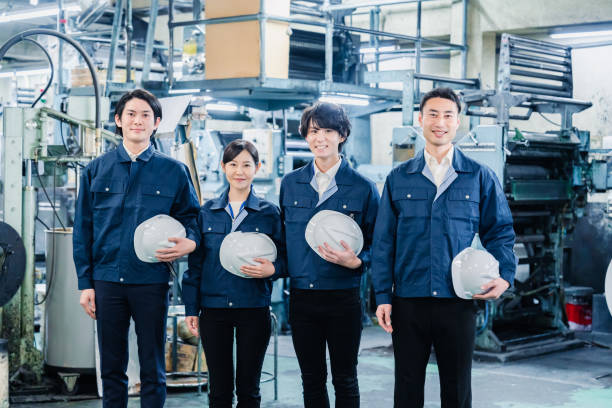 istock Group photo of factory workers 1483043969