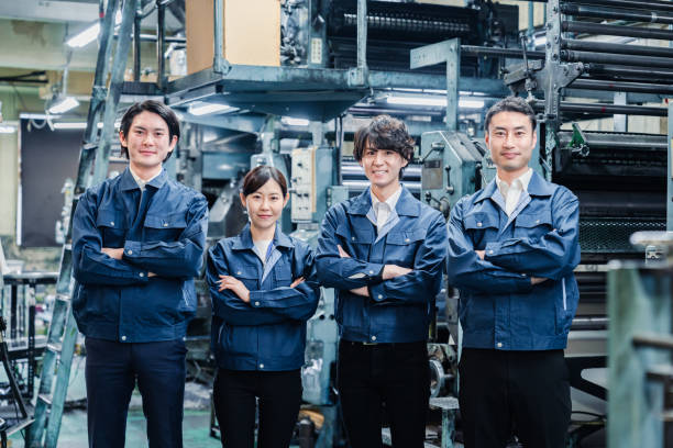 istock Group photo of factory workers 1483043977
