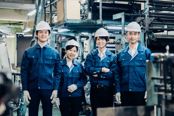 istock Group photo of factory workers 1483043993