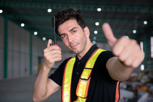 istock warehouse engineer talk with success teamwork for chemical, oil and energy product check in refinery warehouse for shipping and transportation ligistic business 1483045111