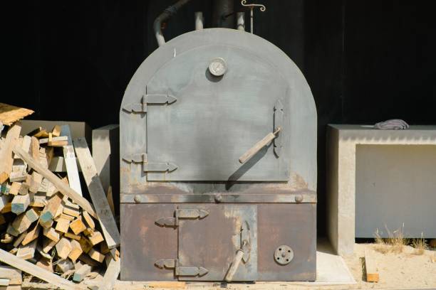 istock Rustic gray oven with stacks of firewood. Los Vilos, Chile. 1483046930