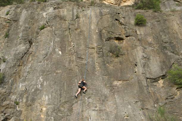 istock Rock climbing girl 1483047440