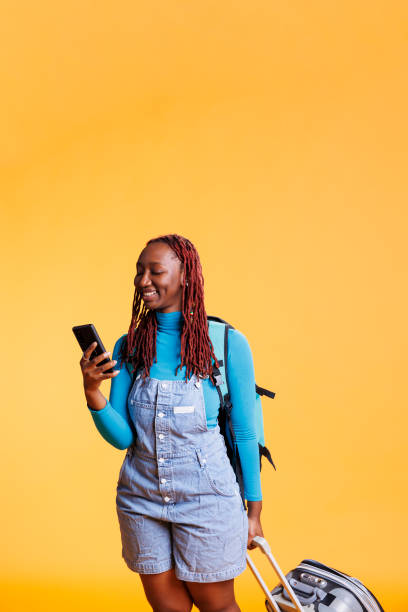 istock Young woman tourist texting messages 1483047448