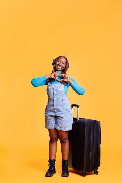 istock Traveller showing heart shape sign 1483049037