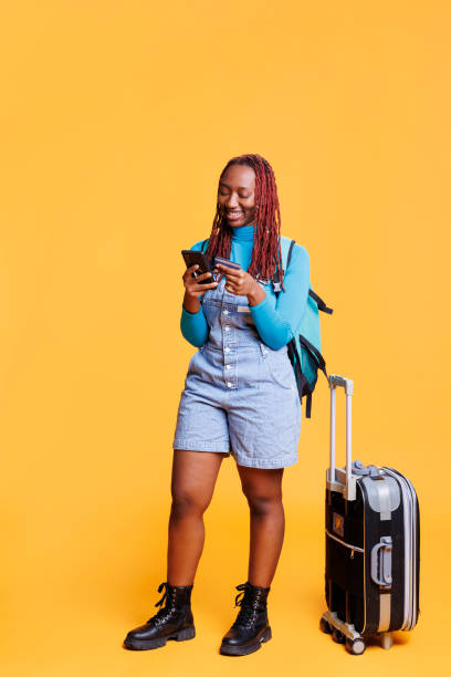 istock Smiling woman doing online shopping 1483049419
