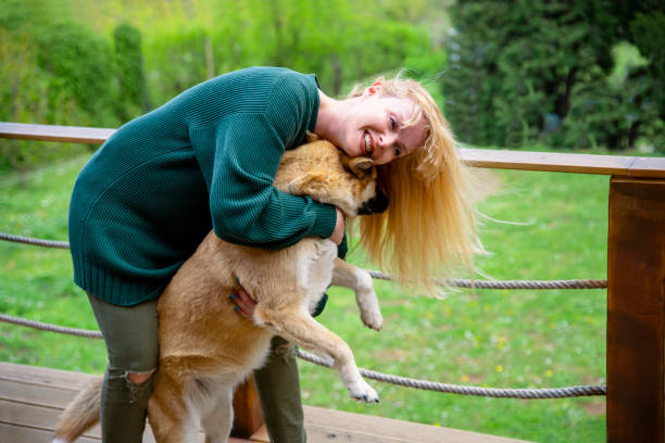 istock Healing cheerful time with her dog outside 1483050831