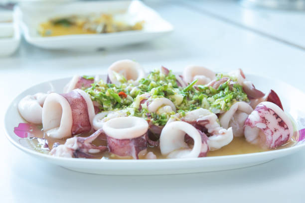 istock Steamed squid with spicy and sour sauce. 1483051023