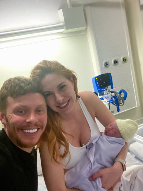 istock Happy Parents with her Newborn 1483051351