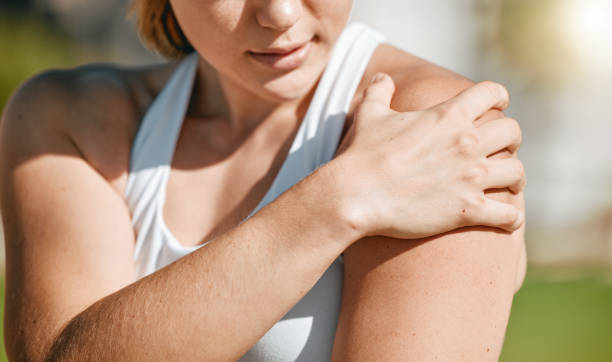 istock Closeup, exercise and woman with shoulder pain, outdoor and inflammation after training, workout and tension. Female, lady and athlete with muscle strain, ache and injury after practice and running 1483052182