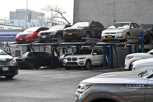 New York City, United States, April 6, 2023 - Stacked mechanical multi-level parking lot / vertical parking in Lower Manhattan, New York City, USA.