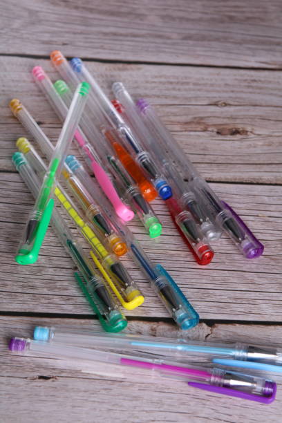istock photo multicolored pens lying on the table 1483055551
