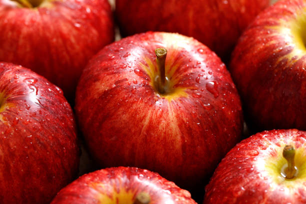 istock fresh red apple texture background in the supermarket 1483056389
