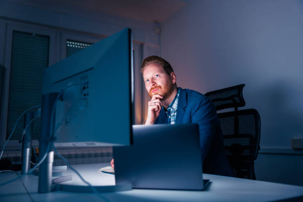 istock Businessman working late in an office 1483056673
